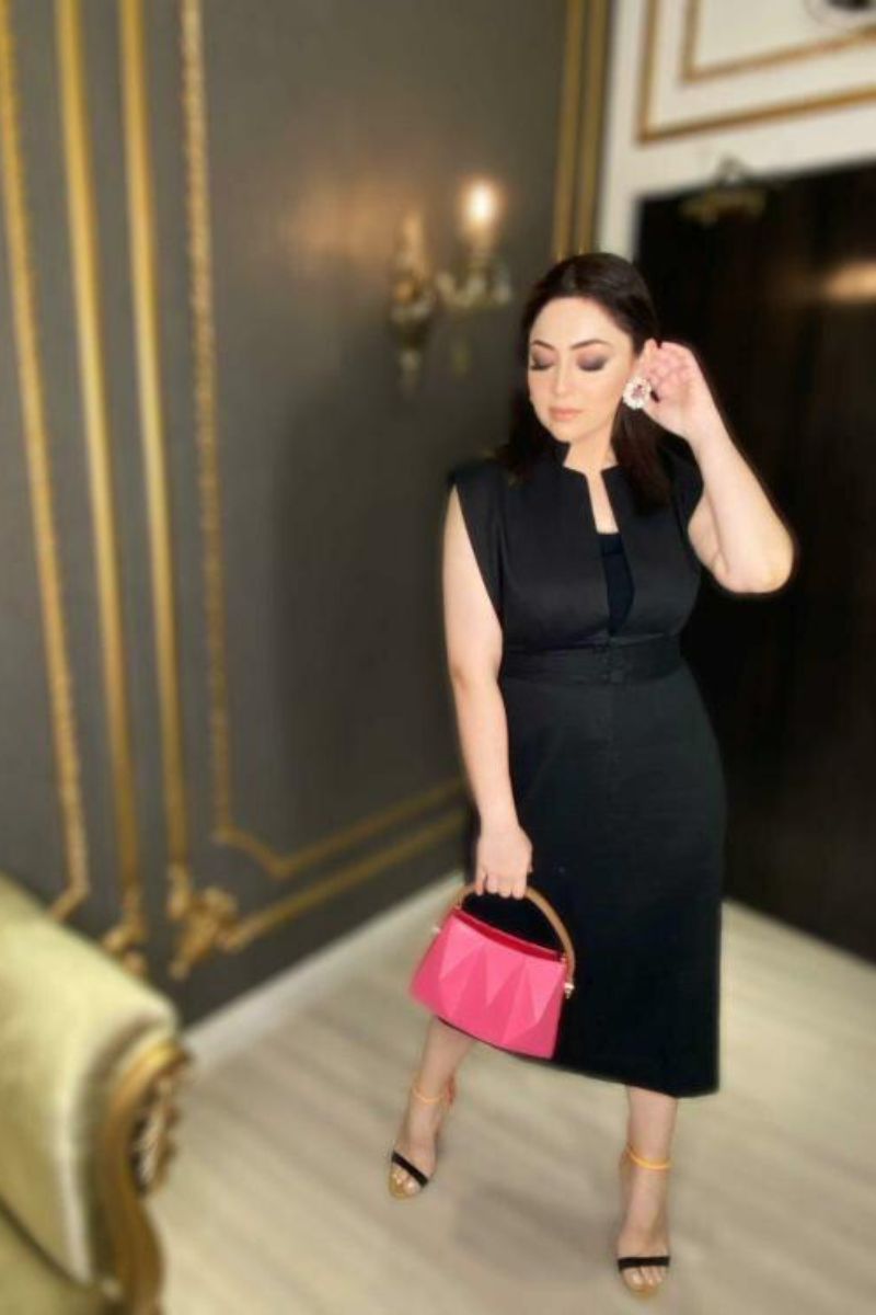 Hadiyya Azer In Black Belted Dress