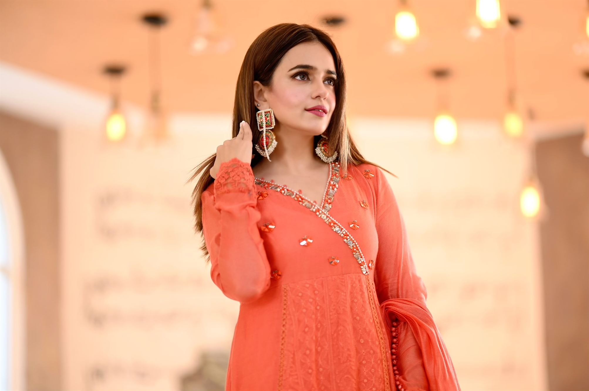 SUMBUL IQBAL SPOTTED IN TANGERINE MIST